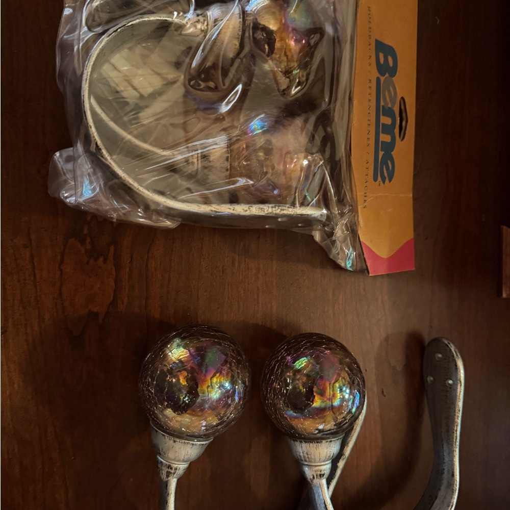 Curtain Holdbacks. Iridescent pink glass balls with silver holder.  2 pair